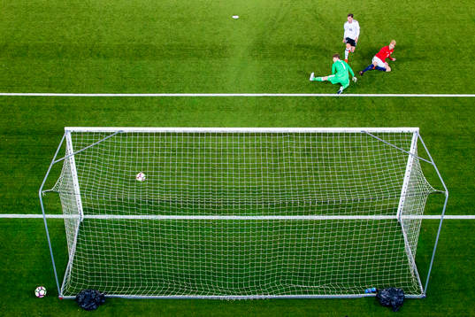 Morten Thorsby of Norway scores 3-1 behind goalkeeper