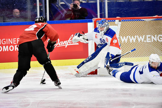 Fredrik Händemark of Malmö Redhawks against goalkeeper