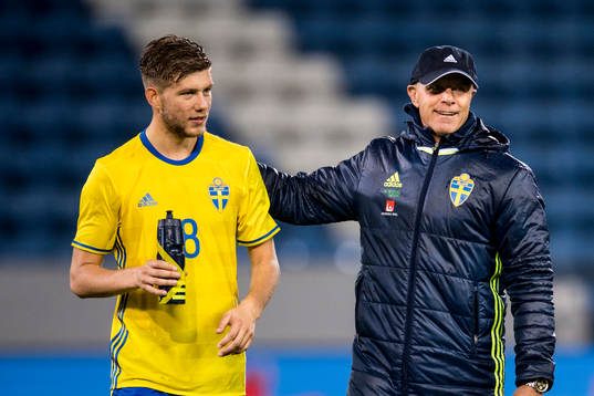 Sveriges Anton Saletros och förbundskapten Roland Nilsson