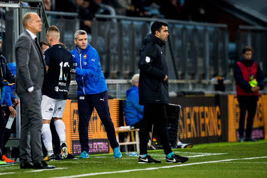 Marcus Pedersen of Strømsgodset and Tor Ole Skullerud,