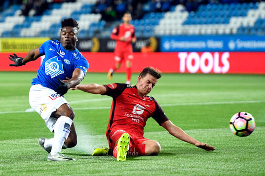 Thomas Olivier Amang Kegueni of Molde and Jonas Grønner of