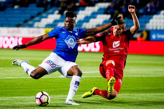 Thomas Olivier Amang Kegueni of Molde and Jonas Grønner of