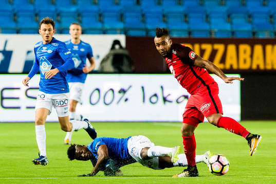 Thomas Olivier Amang Kegueni of Molde and Bismar Acosta of