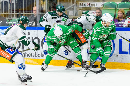 Färjestads Martin Johansson och Rögles Kevin Gagné i