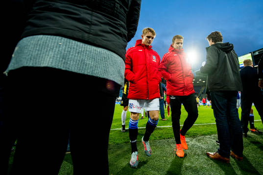 Martin Ødegaard and Nicolai Næss of Heerenveen walk off