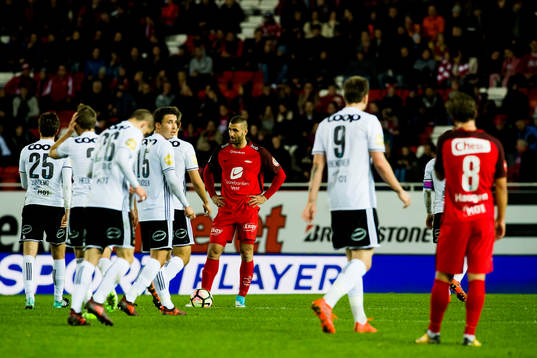 Azar Karadas and Fredrik Haugen of Brann look dejected