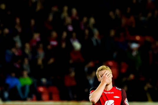 Sivert Heltne Nilsen of Brann looks dejected