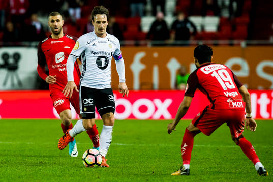 Azar Karadas of Brann, Mike Jensen of Rosenborg and Deyver