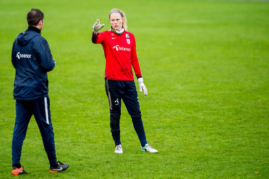 Goalkeeper Ingrid Hjelmseth of Norway talks to Roger