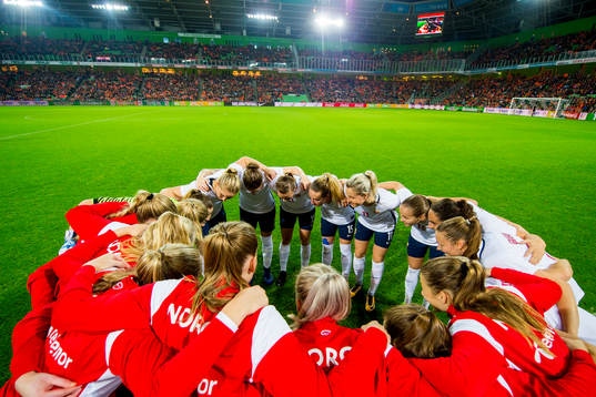 Norway gather in a circle