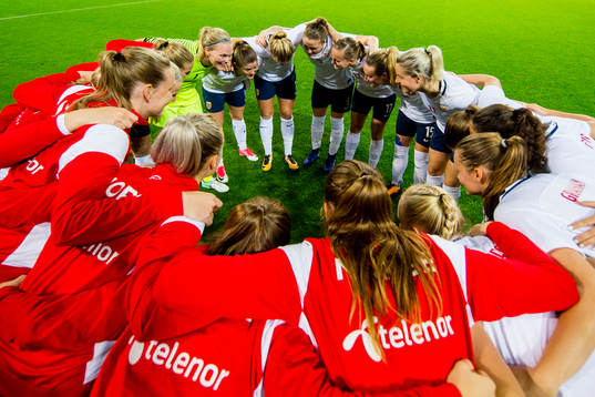 Norway gather in a circle