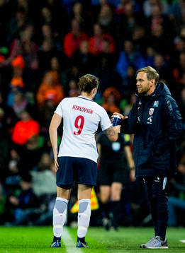 Isabell Herlovsen of Norway and Martin Sjögren, head coach