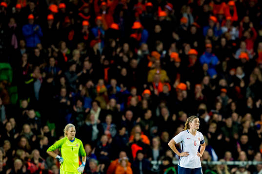 Goalkeeper Ingrid Hjelmseth and Maren Mjelde of Norway look