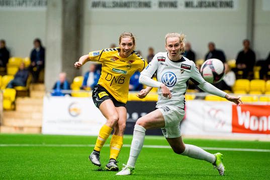 Marte Berget of LSK Kvinner scores 1-0 past defender Stine