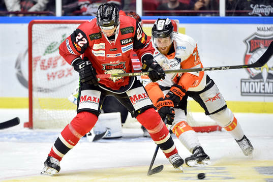 Malmö Redhawks Lars Bryggman och Karlskronas Joachim Rohdin
