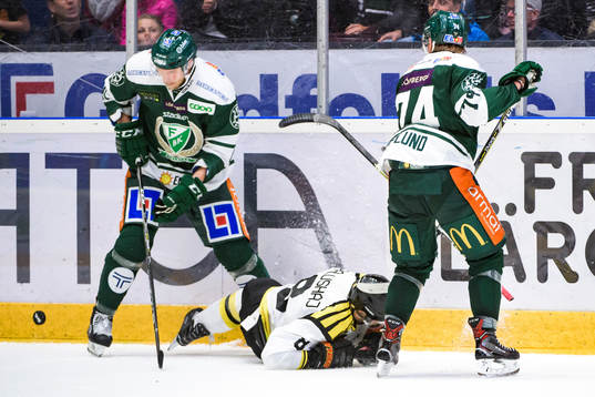 Färjestads Ilari Melart och Brynäs Aaron Palushaj i en
