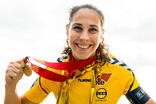 Ingrid Moe Wold of LSK Kvinner poses with the gold medal