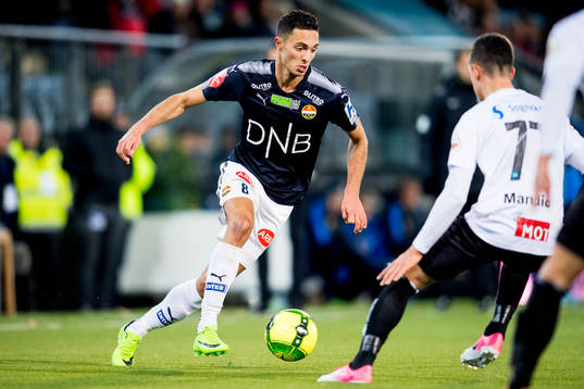 Bassel Jradi of Strømsgodset and Stanisa Mandic of Sogndal