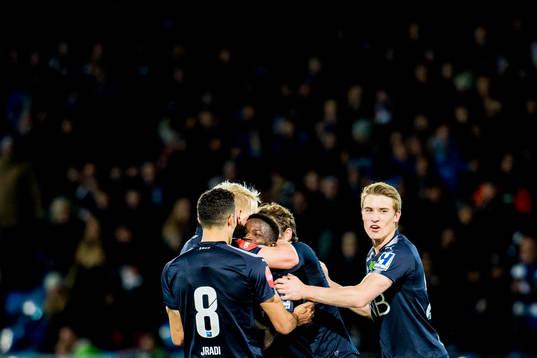 Francisco Junior of Strømsgodset celebrates with teammates