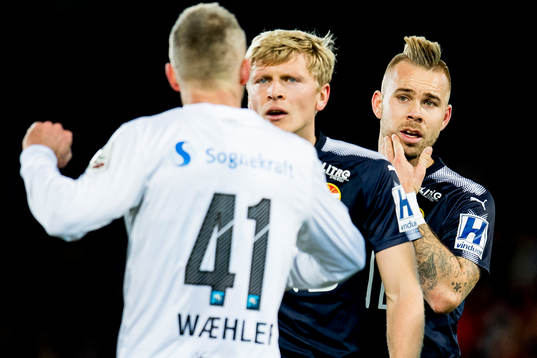 Marcus Pedersen and Jonathan Parr of Strømsgodset argue