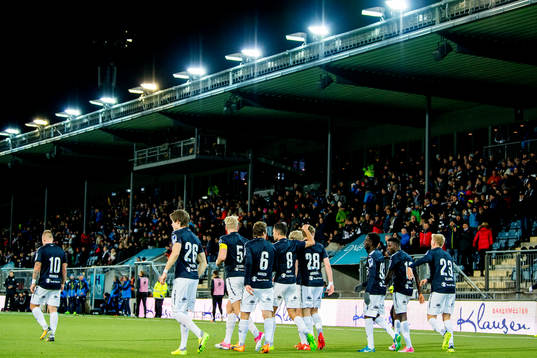 Bassel Jradi of Strømsgodset celebrates with teammates