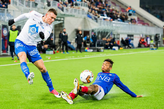 Christoffer Kongste Remmer of Molde and Chidera Ejuke of