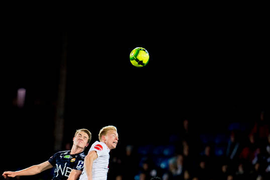 Marius Høibråten of Strømsgodset and Martin Ramsland of