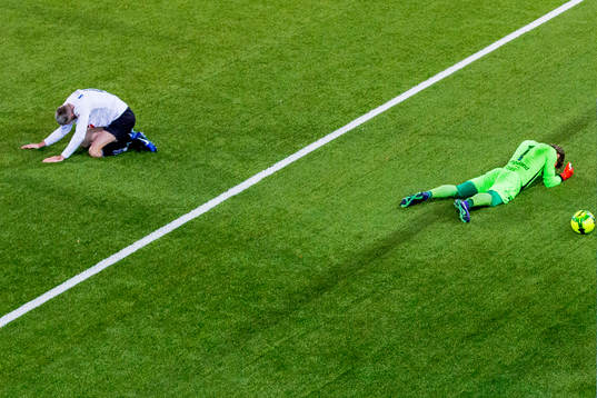 Kjetil Wæhler and goalkeeper Mathias Dyngeland of Sogndal