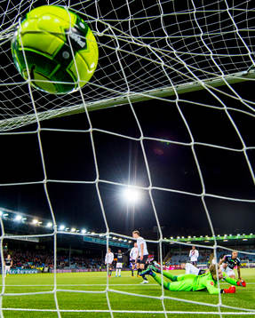 Bassel Jradi of Strømsgodset scores 2-1 behind goalkeeper
