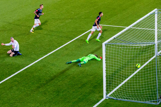 Bassel Jradi of Strømsgodset celebrates with teammate