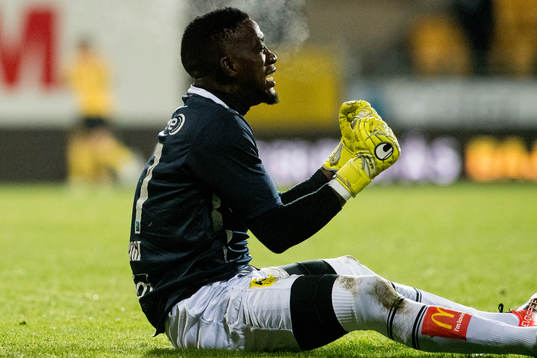 Goalkeeper Arnold Otieno Origi celebrates 3-0