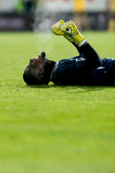 Goalkeeper Arnold Otieno Origi celebrates 3-0