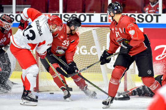 Vladimir Svacina of Ocelari Trinec scores 1-1 behind