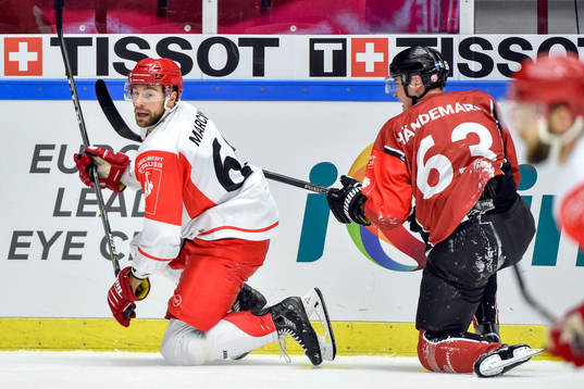 Tomas Marcinko of Ocelari Trinec and Fredrik Händemark of