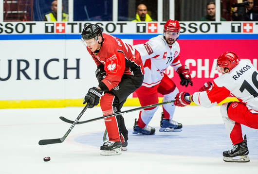 Lars Bryggman of Malmö Redhawks and Bohumil Jank and