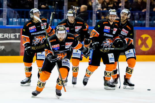 Oskar Nilsson of Frisk Asker and his teammates celebrate 1-0