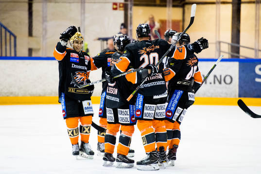 Players of Frisk Asker celebrate 2-1