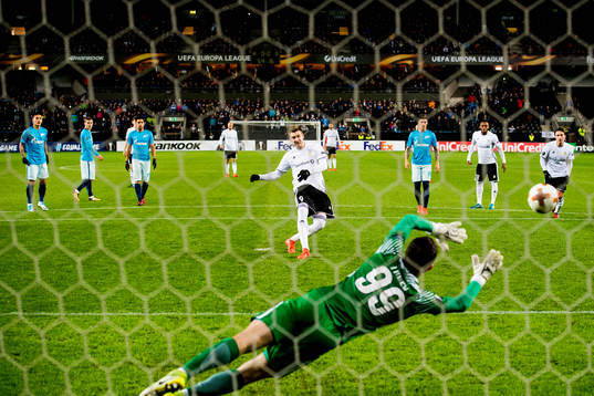 Nicklas Bendtner of Rosenborg scores 1-0