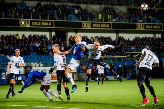 Erling Braut Haaland of Molde and Nikita Baranov of