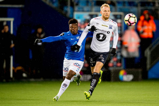 Thomas Olivier Amang Kegueni of Molde and Dan Peter
