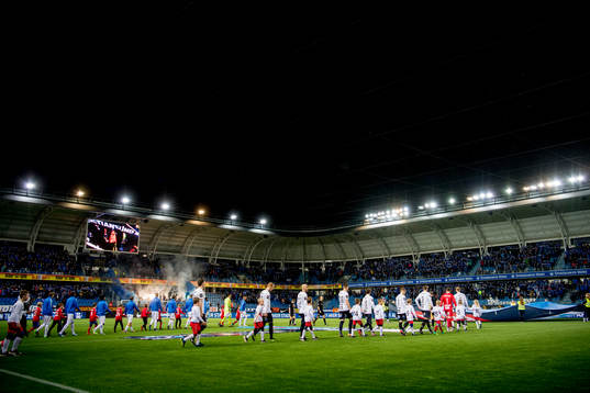 Players enter the pitch