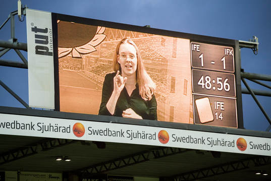 Teckentolk på storbildsskärmen