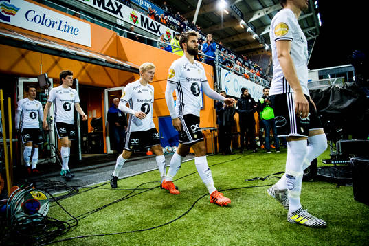 Birger Meling and Jørgen Skjelvik of Rosenborg enter the
