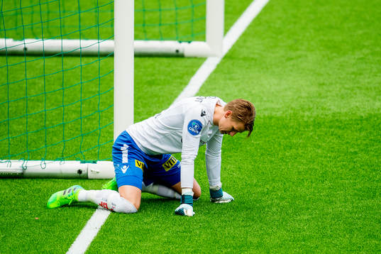 Goalkeeper Borger Thomas of Åsane looks dejected