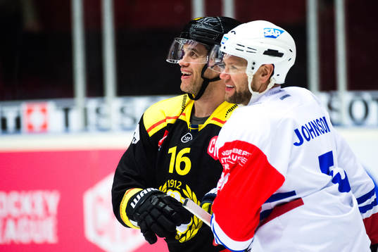 Daniel Paille of Brynäs and Aaron Johnson of Adler Mannheim
