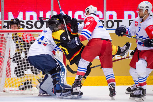 Garrett Festerling of Adler Mannheim with a interference