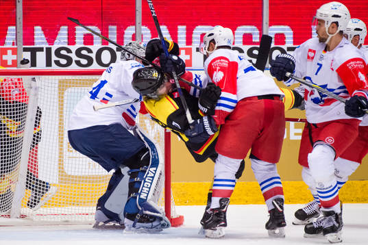 Garrett Festerling of Adler Mannheim with a interference