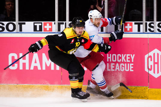 Marcus Ersson of Brynäs and Andrew Desjardins of Adler