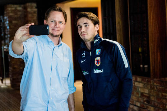 Anders Trondsen of Norway poses for a selfie with a fan