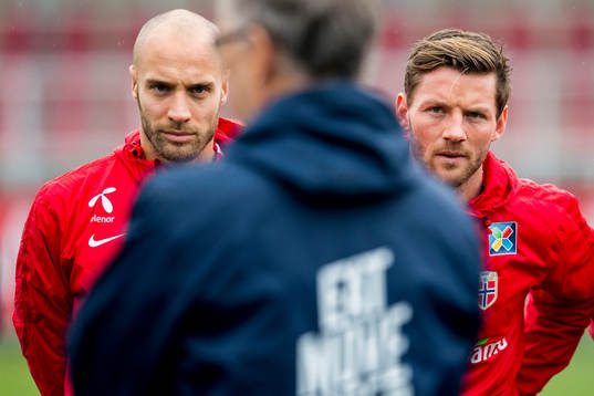 Tore Reginiussen and Pål Alexander Kirkevold listen to